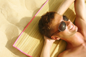 Man Sunbathing on the beach